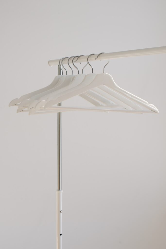 picture of empty closet showing empty hangers